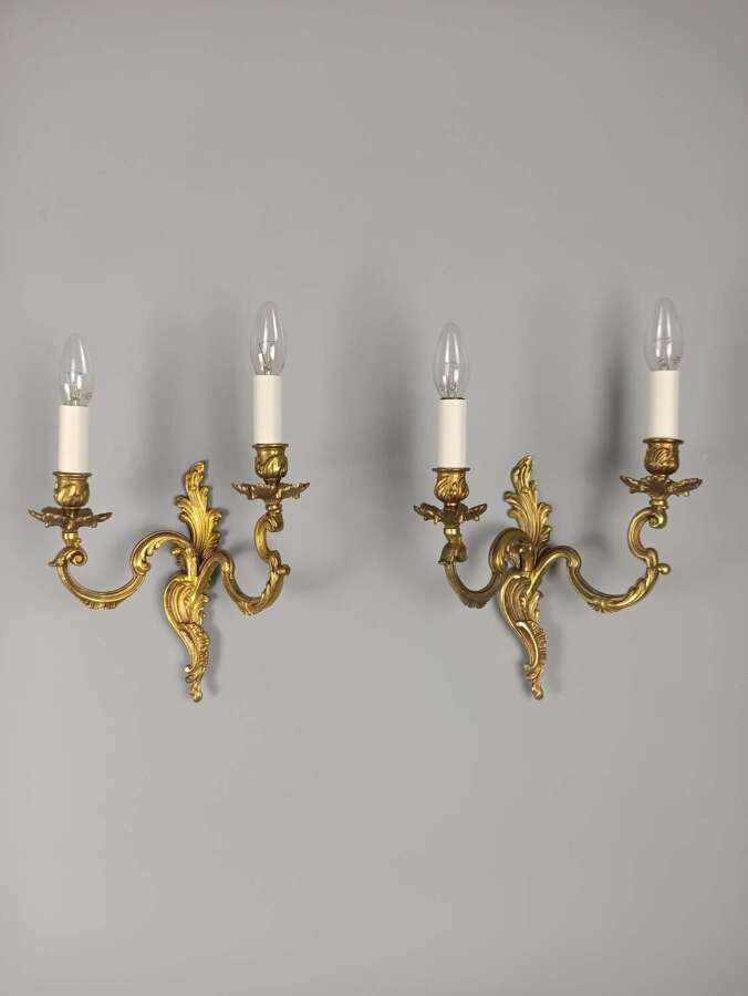Pair of French Antique Twin Arm Rococo Gilded Bronze Wall Lights